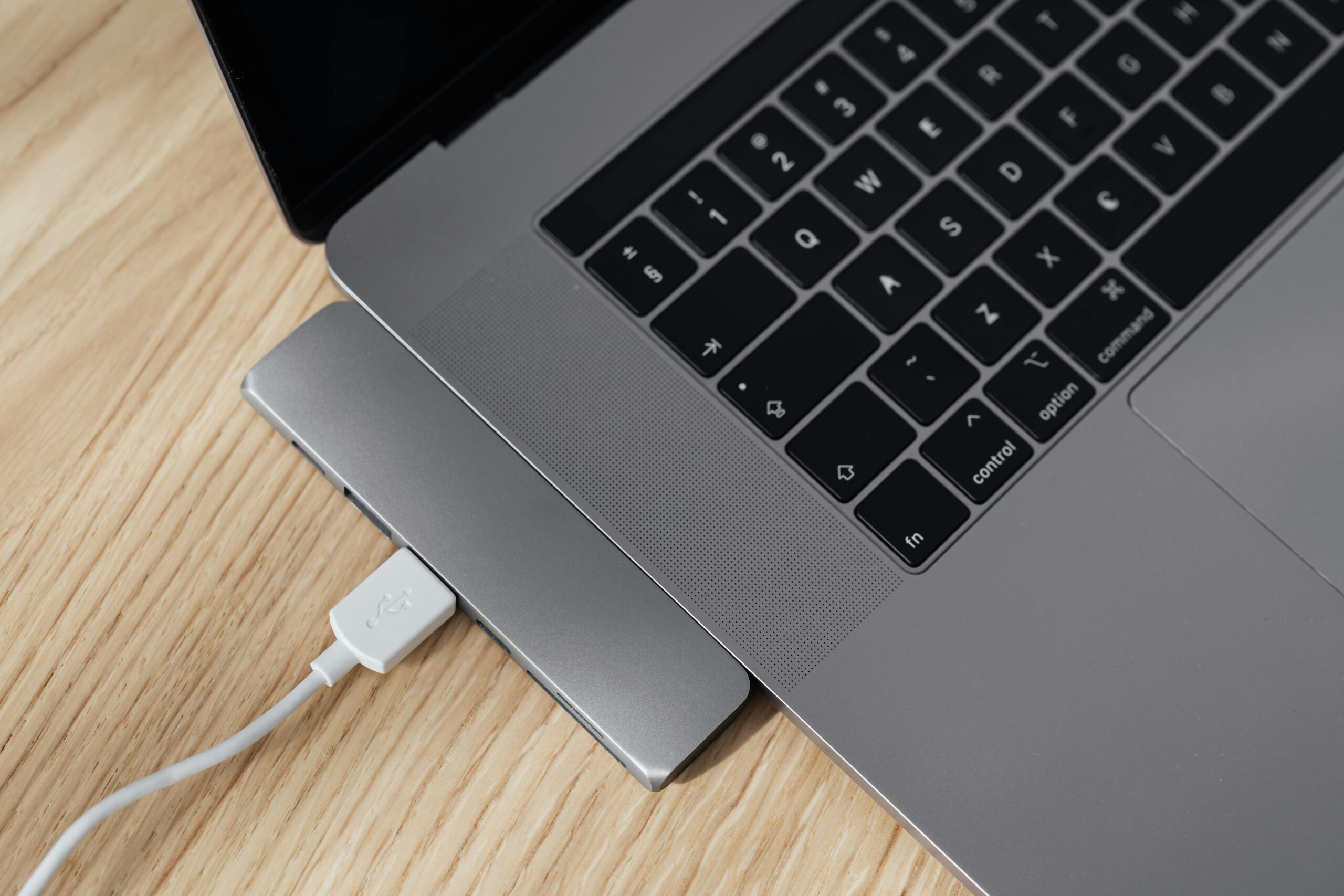 USB-C hub vs docking station setup on a laptop desk